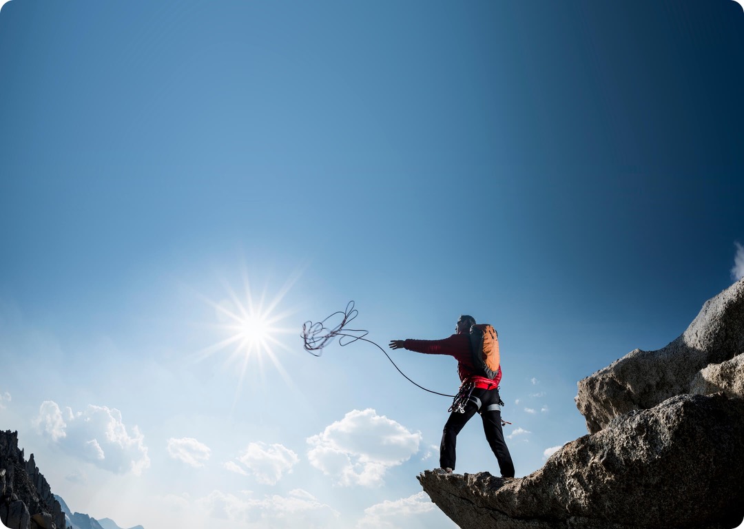 Person climbing a rock face